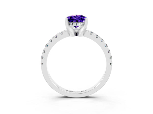 Platinum Pear Cut Tanzanite Solitaire Ring with Round  Pavé Band and Four-Prong Setting