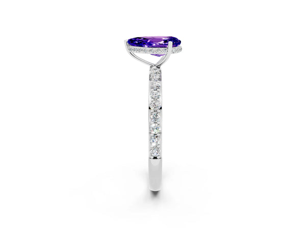 Platinum Pear Cut Tanzanite Solitaire Ring with Pavé Band and Hidden Halo