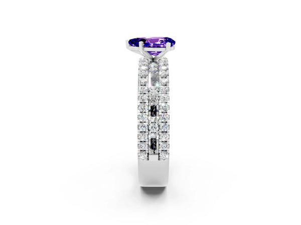 Silver Pear Cut Tanzanite Solitaire Ring with Pavé and Channel Set Band