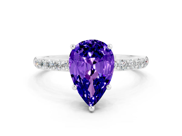 Platinum Pear Cut Tanzanite Solitaire Ring with Round  Pavé Band and Prong Setting