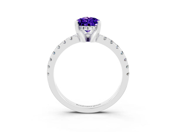 White gold Pear Cut Tanzanite Solitaire Ring with Round  Pavé Band and Four-Prong Setting