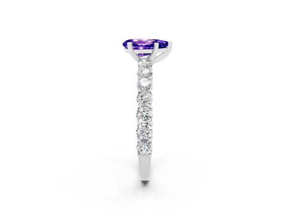 Silver Pear Cut Tanzanite Solitaire Ring with Shared Prong Pavé Band and Four-Prong Setting