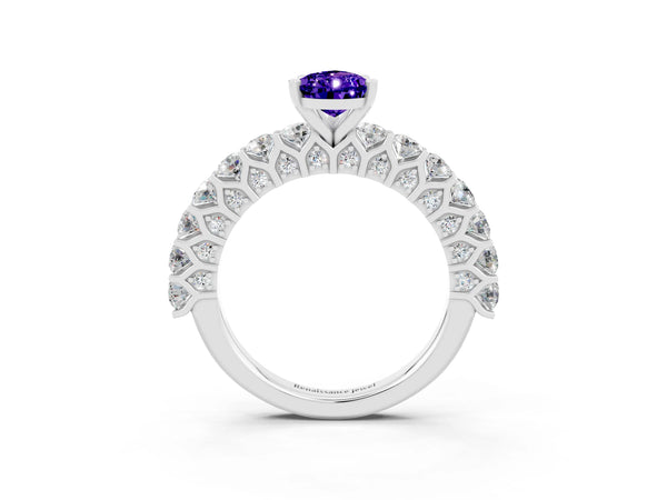 Silver Pear Cut Tanzanite Solitaire Ring with Shared Prong Pavé Band and Four-Prong Setting