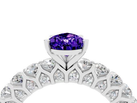 White gold Pear Cut Tanzanite Solitaire Ring with Shared Prong Pavé Band and Four-Prong Setting_4