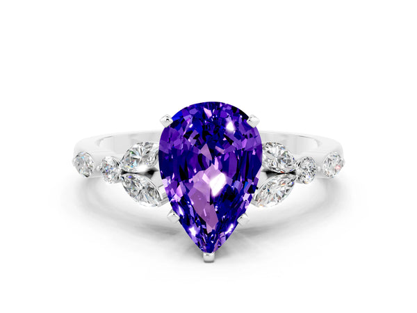 Silver Pear Cut Tanzanite Solitaire Ring with Side Stones and Four-Prong Setting