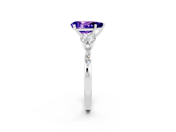 White gold Pear Cut Tanzanite Solitaire Ring with Side Stones and Four-Prong Setting