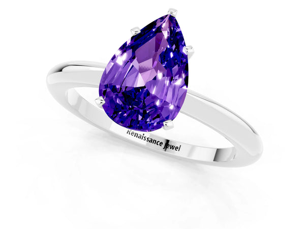 White gold Pear Cut Tanzanite Solitaire Ring with Six-Prong Setting and Classic Band