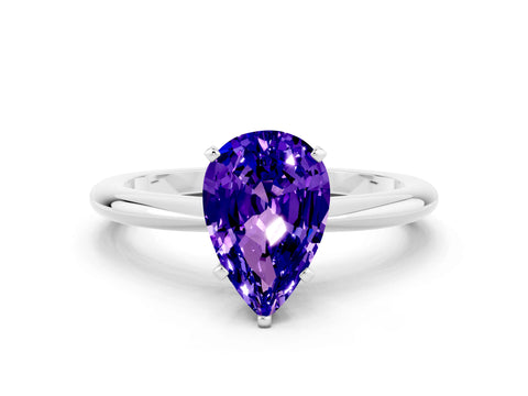 White gold Pear Cut Tanzanite Solitaire Ring with Six-Prong Setting and Classic Band