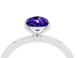 White gold Pear Cut Tanzanite Solitaire Ring with Thin Band and Prong Setting_40