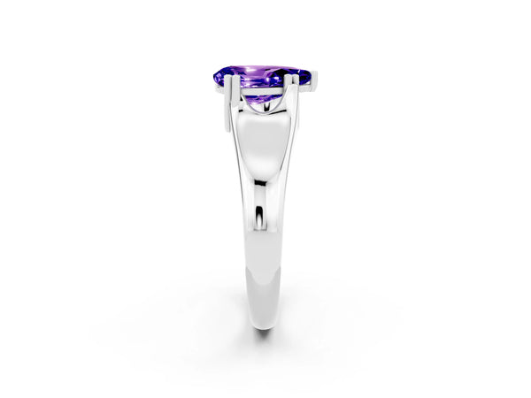 Platinum Pear Cut Tanzanite Solitaire Ring with Wide Band and Prong Setting