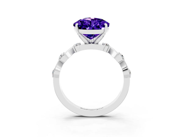 Silver Pear Cut Tanzanite Solitaire Twisted Band with Round  Accents and Prong Setting