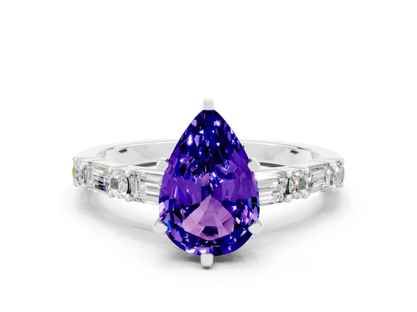 Platinum Pear Cut Tanzanite Solitaire with Side Baguettes and Channel Set Band