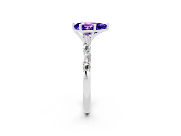 White gold Pear Cut Tanzanite Solitaire with Side Baguettes and Channel Set Band