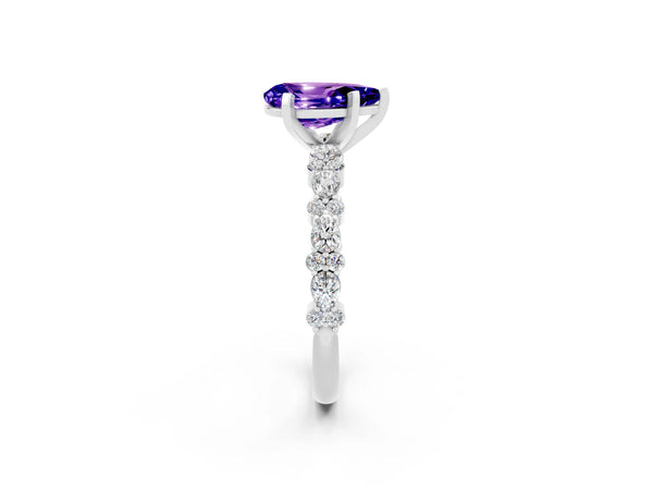 White gold Pear Cut Tanzanite Side Stone Solitaire Ring with Round  and Four-Prong Setting