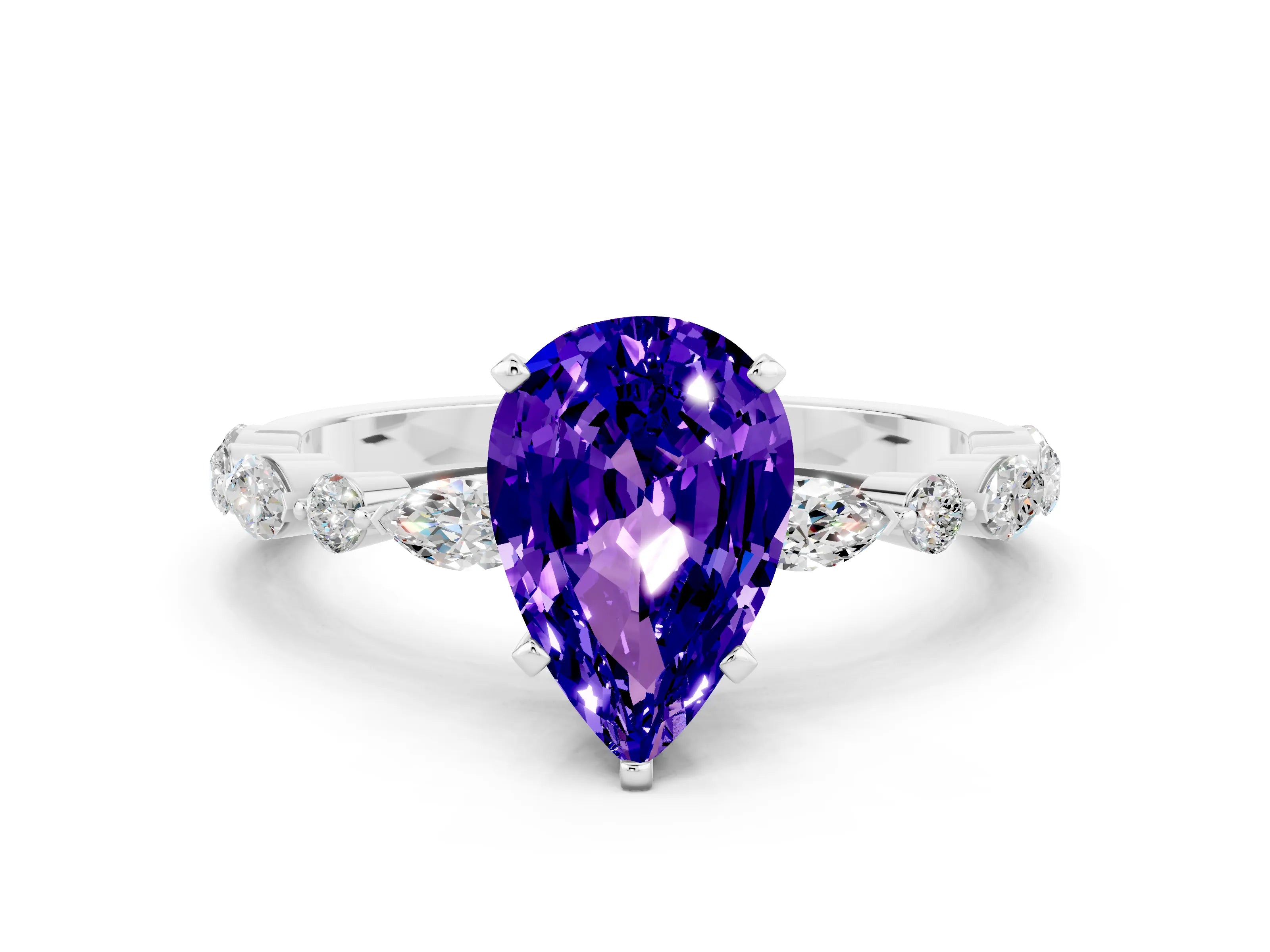 White gold Pear Cut Tanzanite Solitaire with Side Stones on a Pavé Band and Four-Prong Setting