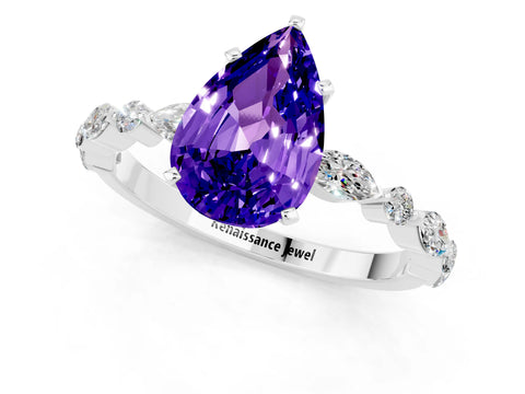 White gold Pear Cut Tanzanite Solitaire with Side Stones on a Pavé Band and Four-Prong Setting_1