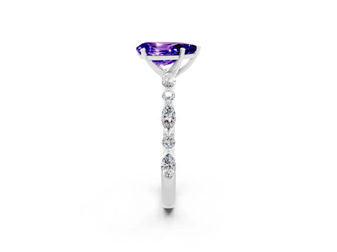 White gold Pear Cut Tanzanite Solitaire with Side Stones on a Pavé Band and Four-Prong Setting_2
