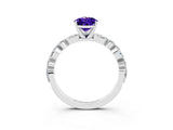 White gold Pear Cut Tanzanite Solitaire with Side Stones on a Pavé Band and Four-Prong Setting_3