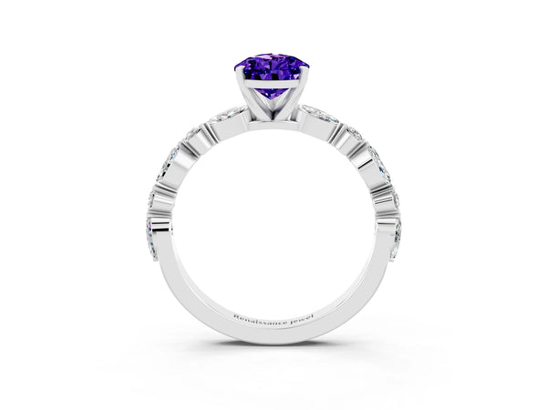 Silver Pear Cut Tanzanite Ring with Marquise and Round  Side Stones and Four-Prong Setting