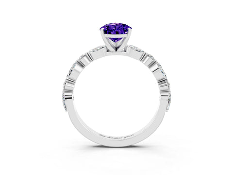 White gold Pear Cut Tanzanite Solitaire with Side Stones on a Pavé Band and Four-Prong Setting_3