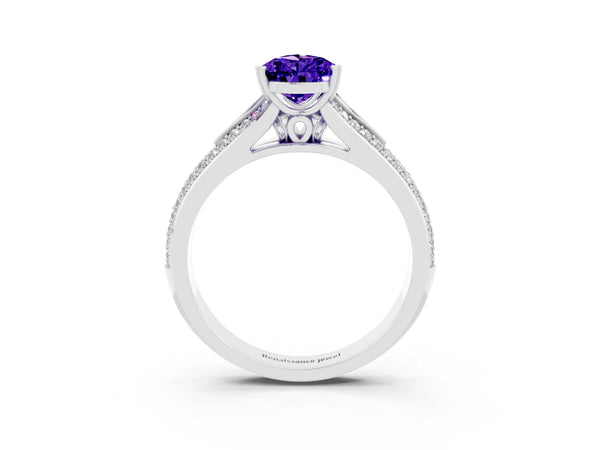 Platinum Pear Cut Tanzanite Split Shank Engagement Ring with Pavé Band