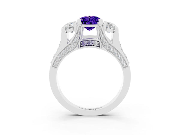 White gold Pear Cut Tanzanite Three-Stone Ring with Channel Set Band and Four-Prong Setting