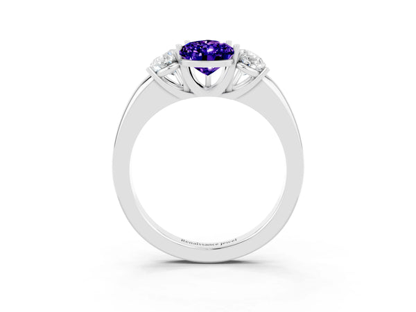 Silver Pear Cut Tanzanite Three-Stone Ring with Four-Prong Setting and Classic Band