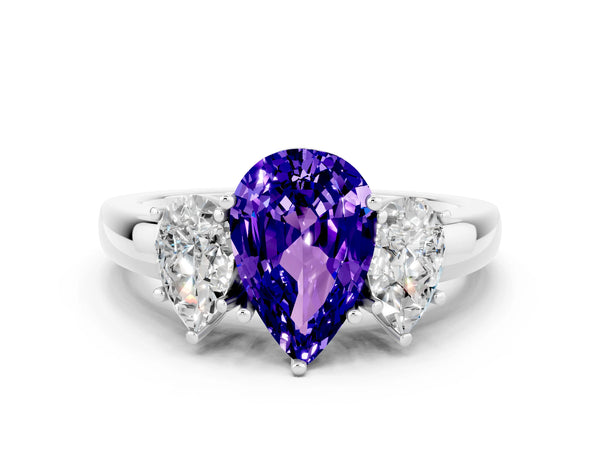 White gold Pear Cut Tanzanite Three-Stone Ring with Four-Prong Setting and Classic Band