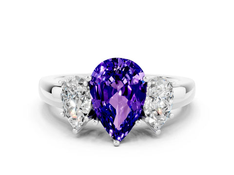 White gold Pear Cut Tanzanite Three-Stone Ring with Four-Prong Setting and Classic Band