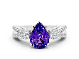 White gold Pear Cut Tanzanite Three-Stone Ring with Pavé Split Shank and Four-Prong Setting_12