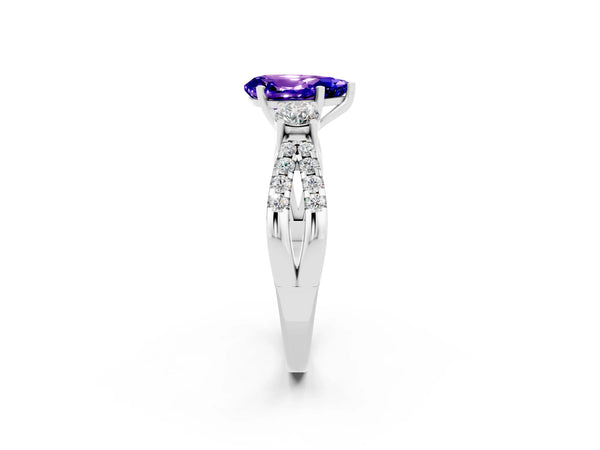 White gold Pear Cut Tanzanite Three-Stone Ring with Pavé Split Shank and Four-Prong Setting