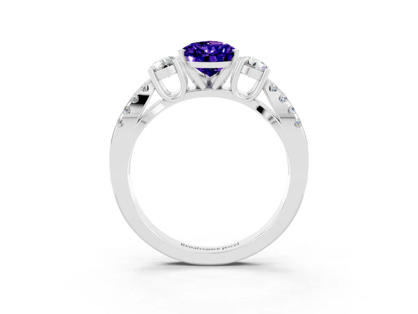 White gold Pear Cut Tanzanite Three-Stone Ring with Pavé Split Shank and Four-Prong Setting