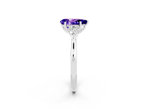 White gold Pear Cut Tanzanite Three-Stone Ring with Pear  Side Stones and Prong Setting