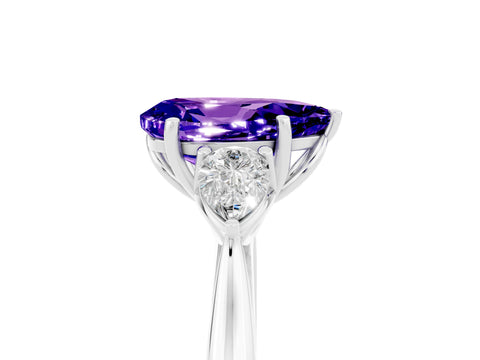 White gold Pear Cut Tanzanite Three-Stone Ring with Pear Side Stones and Four-Prong Setting_17