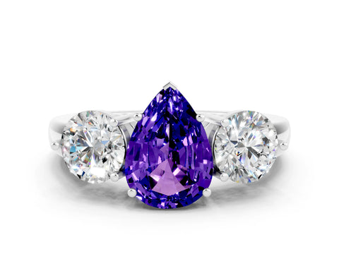 White gold Pear Cut Tanzanite Three-Stone Ring with Prong Setting and Classic Band