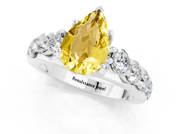 White gold Pear Cut Yellow Sapphire Engagement Ring with Pavé Band and Four-Prong Setting