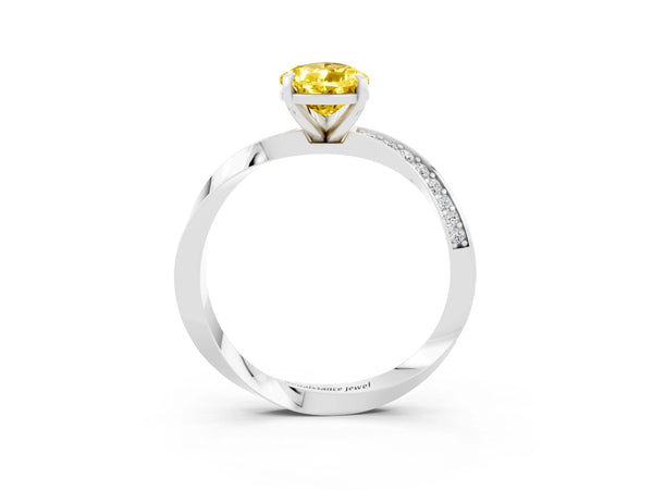 White gold Pear Cut Yellow Sapphire Engagement Ring with Side Stone Accents and Four-Prong Setting