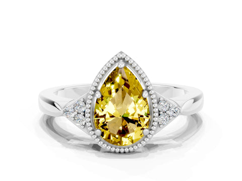 White gold Pear Cut Yellow Sapphire Halo Ring with Tapered Band and Four-Prong Setting