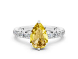 White gold Pear Cut Yellow Sapphire Pavé Solitaire Ring with Round Band and Prong Setting_12