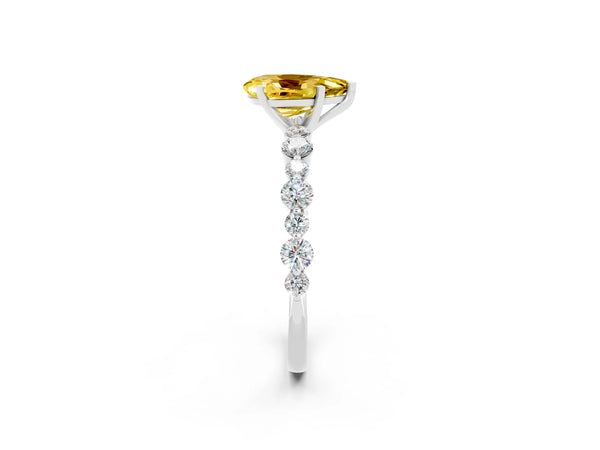 Platinum Pear Cut Yellow Sapphire Prong Set Engagement Ring with Pavé Band