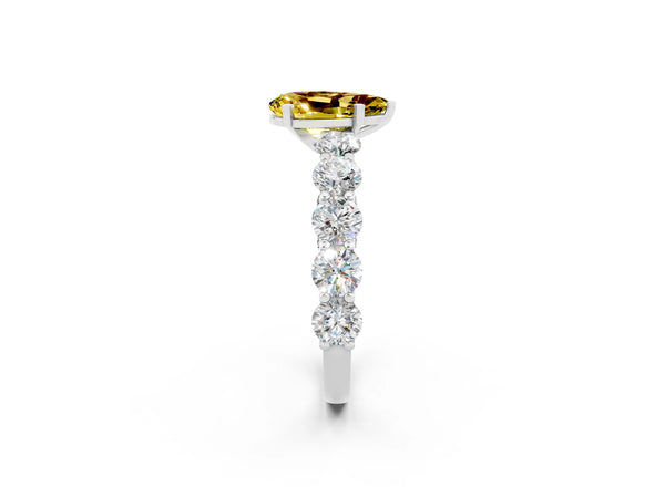 Platinum Pear Cut Yellow Sapphire Prong Setting with Side Stones on a Pave Band