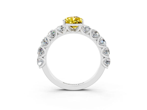 Silver Pear Cut Yellow Sapphire Prong Setting with Side Stones on a Pave Band