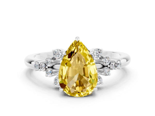 White gold Pear Cut Yellow Sapphire Ring with Side Stones and Four-Prong Setting