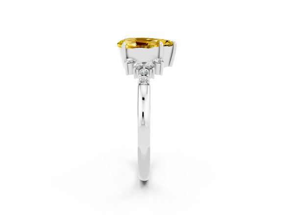 Platinum Pear Cut Yellow Sapphire Ring with Side Stones and Four-Prong Setting