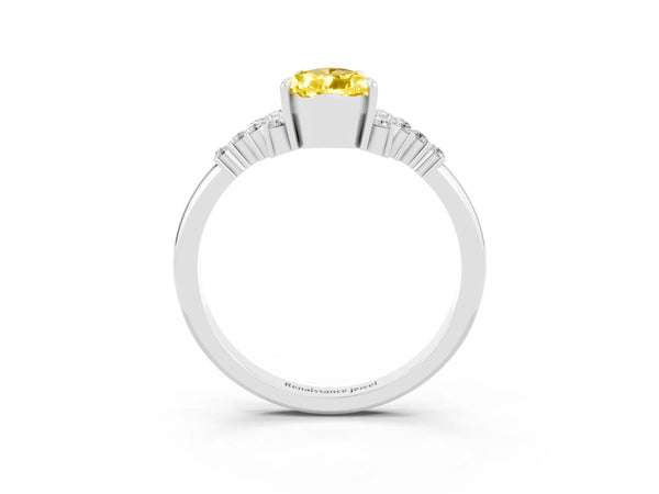 Silver Pear Cut Yellow Sapphire Ring with Side Stones and Four-Prong Setting