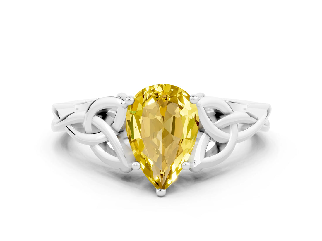 White gold Pear Cut Yellow Sapphire Solitaire Engagement Ring with Celtic Knot Band and Four-Prong Setting_24