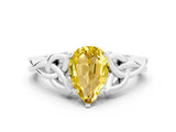 White gold Pear Cut Yellow Sapphire Solitaire Engagement Ring with Celtic Knot Band and Four-Prong Setting_24