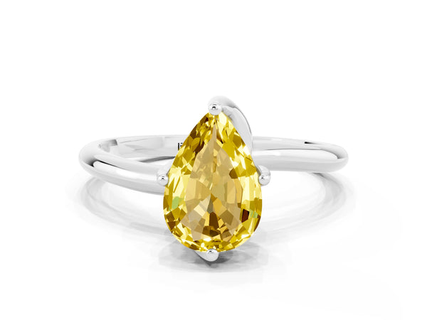 Silver Pear Cut Yellow Sapphire Solitaire Engagement Ring with Four-Prong Setting and Classic Band