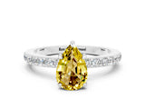 White gold Pear Cut Yellow Sapphire Solitaire Engagement Ring with Pavé Band and Four-Prong Setting_36