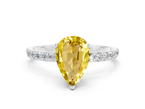 White gold Pear Cut Yellow Sapphire Solitaire Engagement Ring with Pavé Band and Prong Setting